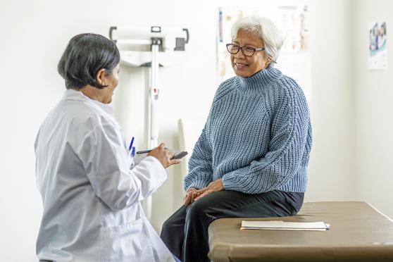 A woman and doctor talking